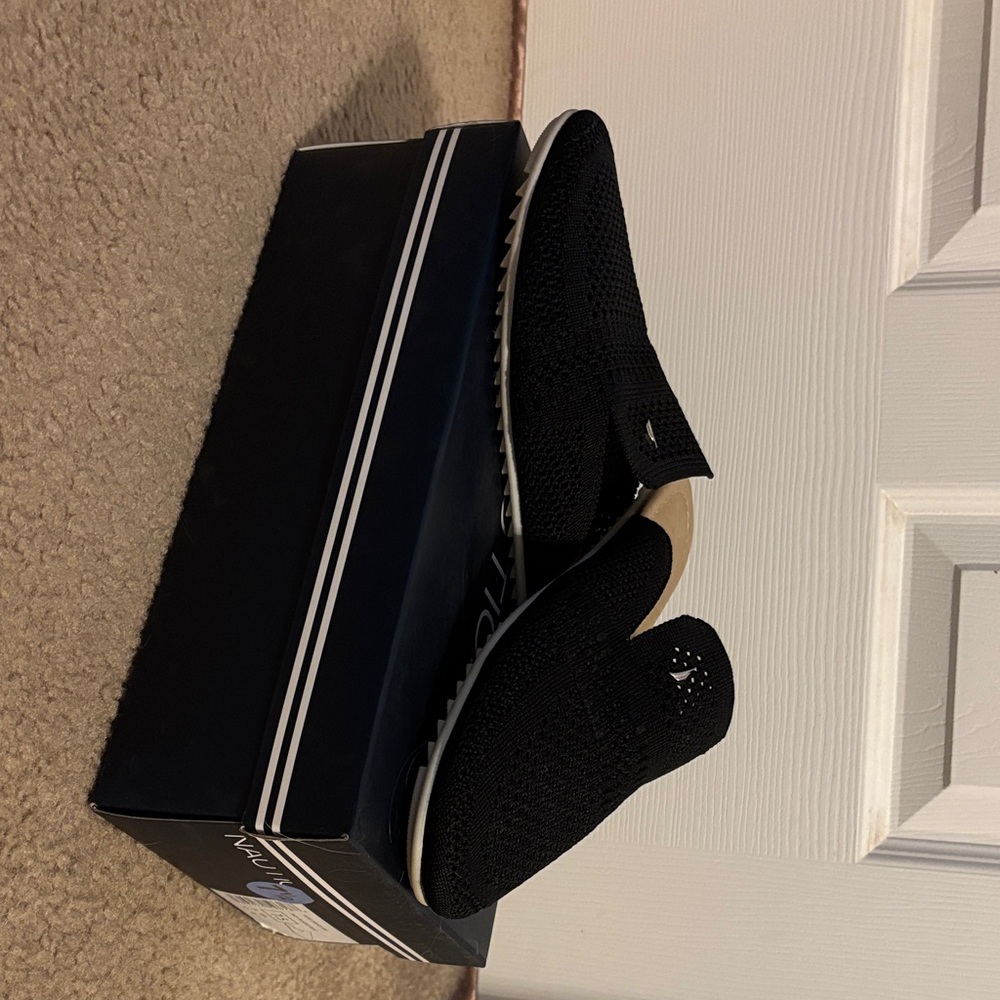 Woman’s Black Knit Mules